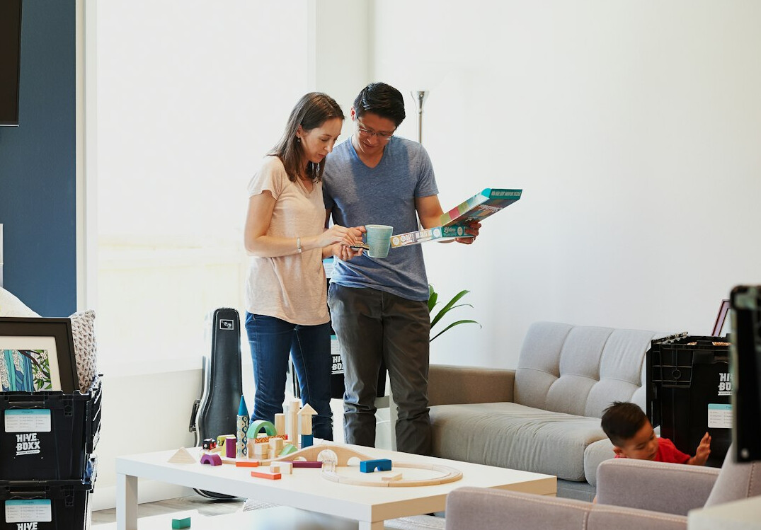 family using smart home devices